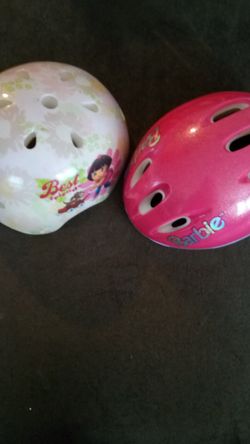 Two kids bike helmets
