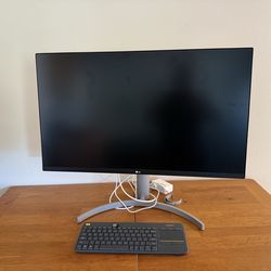 Computer monitor an LG 32-inch Class UltraFine 4K UHD IPS Monitor (