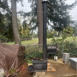 Small Wood Stove  900sq’ Rooms 