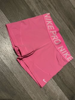 Pink Nike Pro shorts