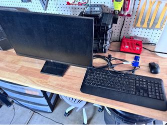 HP 24” monitor and accessories.