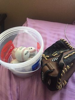 Baseballs and glove