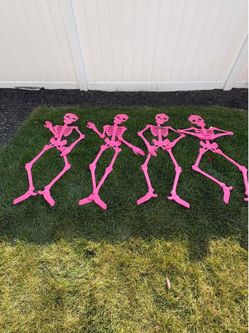 Set of 4 Pink 59” Plastic Skeleton Decorations