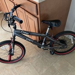 18 Inch Abyss BMX Kids Bike With Red Accents.