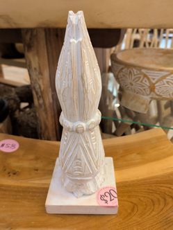 Wooden prayer sculpture
