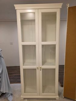 2 Curio Cabinets