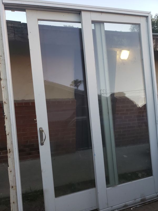 Anderson dual pane 8 foot high by 6 feet wide sliding door for Sale in