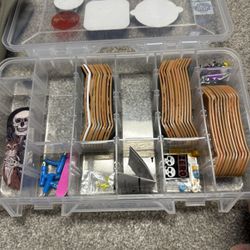 Tech deck hall, 32 tech decks, one professional board