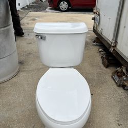 Toilet In Good Condition Clean It measures 15 inches in height