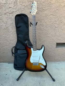 JohnsonEletric guitar regular scale case and stand included