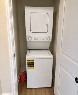 White Stacked Washer and Dryer Unit