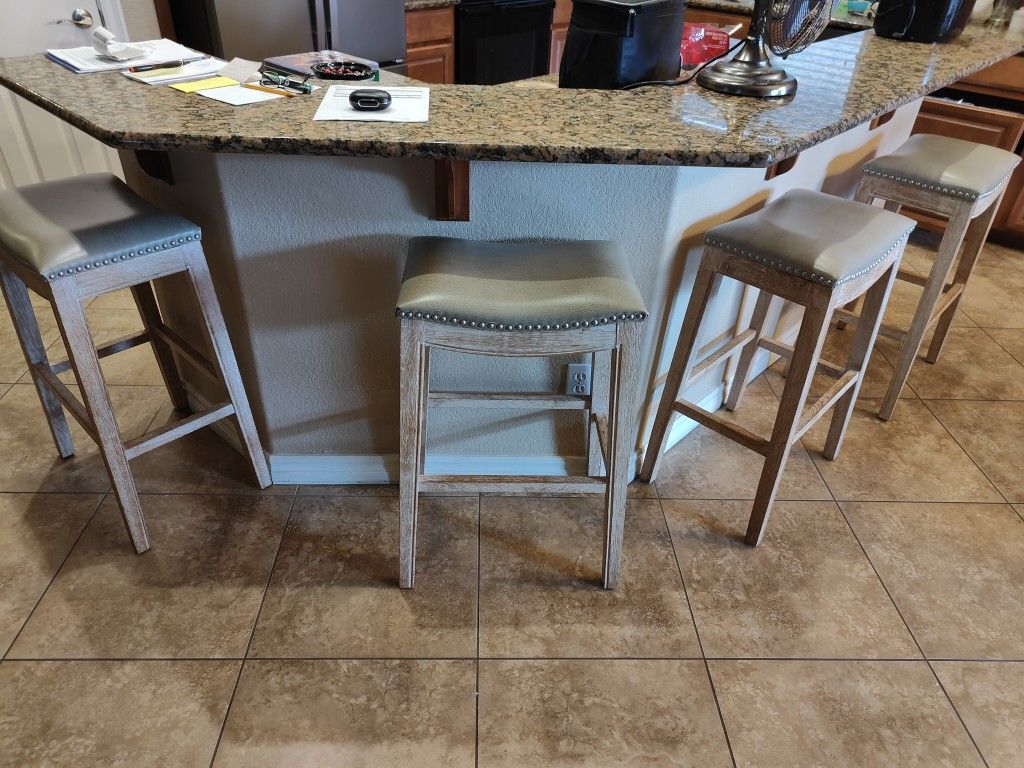 Four 30 inch high bar stools