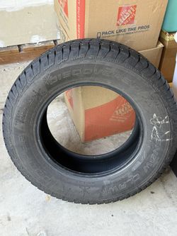4 Studded Snow Tires Used One Season 