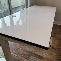 Uplift V2 Standing Desk 6’x30” — White Frame + Whiteboard Top + Casters — $450