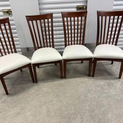 Solid steel stools with leather seats and they all swirl  30 “ high to seat … $100 for all