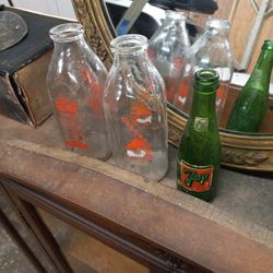 Vintage One Quart Milk Bottles And A 7-Up Bottle
