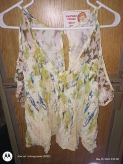 Size large woman's polyester with designs dress shirt