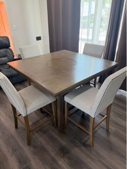 Four top bistro table and chairs