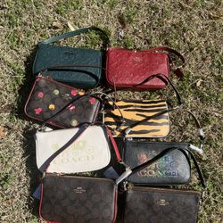 Coach nolita 19 Wristlet