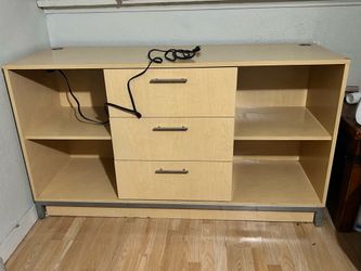 Dresser with outlet