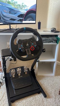 Logitech steering wheel + pedals + stand for Ps4/Ps3