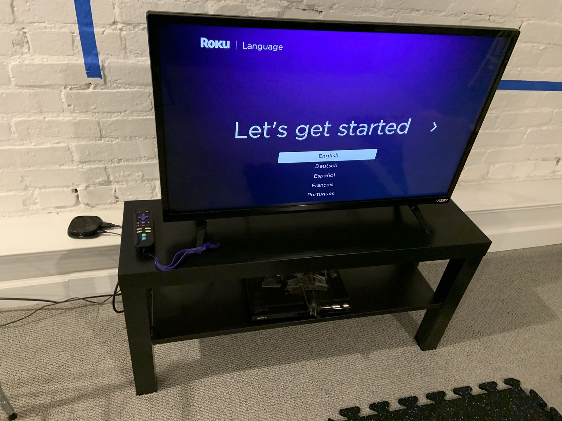 32” TV, stand, and Roku. All-in-one package