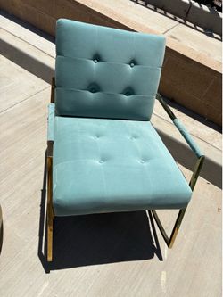 Tufted suede rocking chair