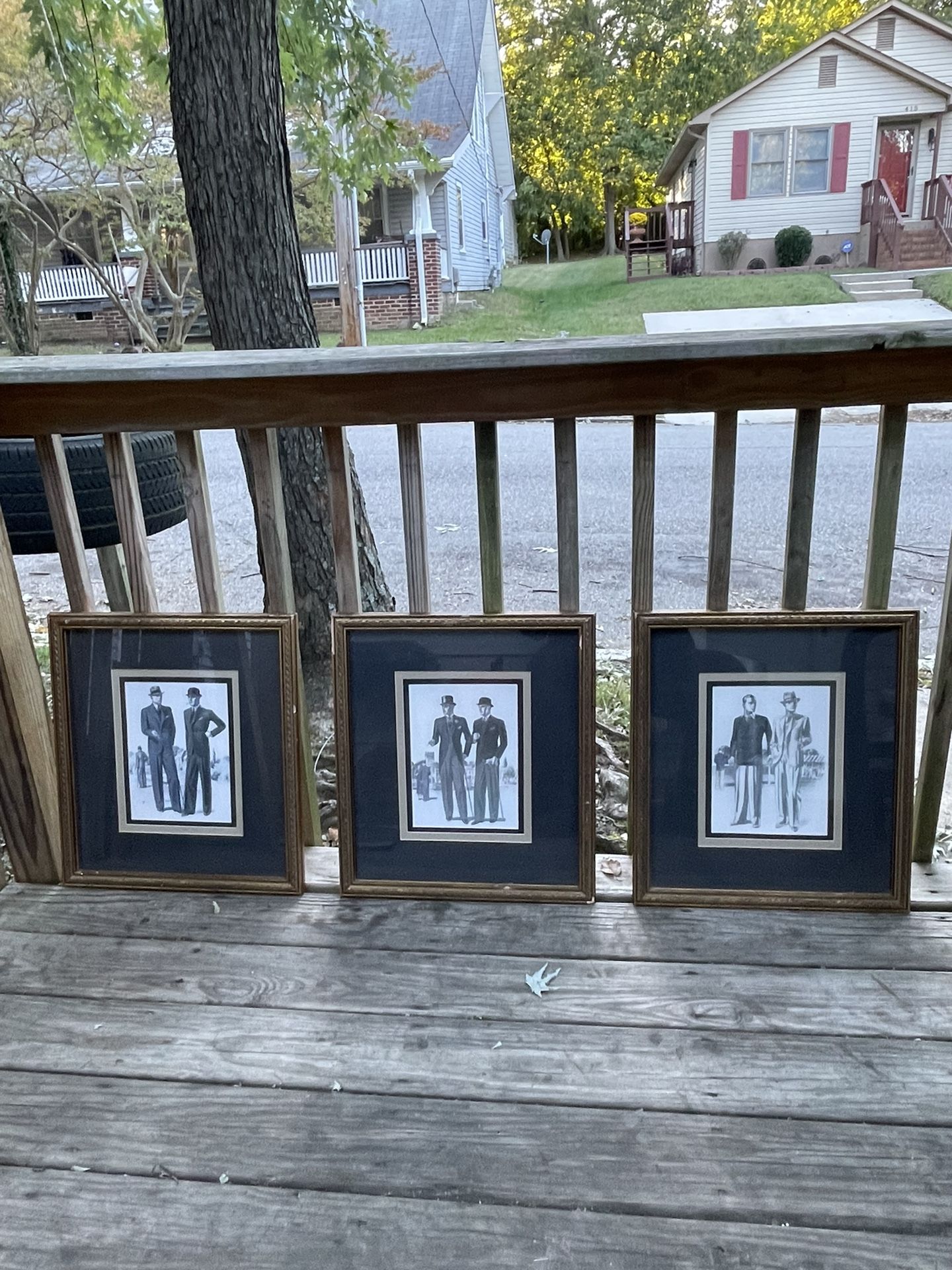 Three pictures and golden frame