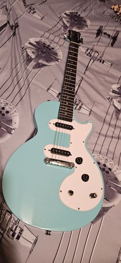 Les Paul epiphone music maker e1 torquise+ new set of strings