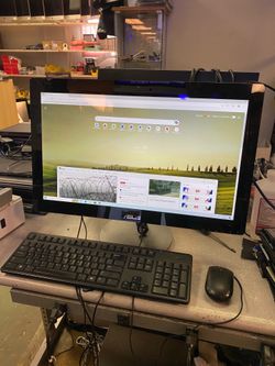 ASUS ET2322I AIO 23 Inch PC desktop  All in one touchscreen  Intel i7-4500U CPU  16G RAM  1TB HDD Windows 10 pro. It as a crack on the top, left side 