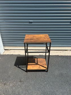 Small metal stand with two shelves