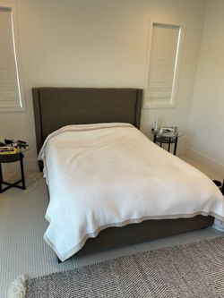 Upholstered Bed Frame with Wingback Headboard