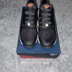 Size 10, men’s brand new unworn Reebok shoes with tags and box