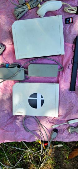 Two Wii consoles with hardware and 64GB Sandisk Memory Card