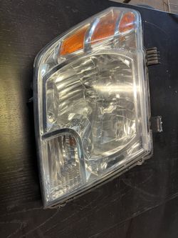 15 Frontier Driver Headlight 