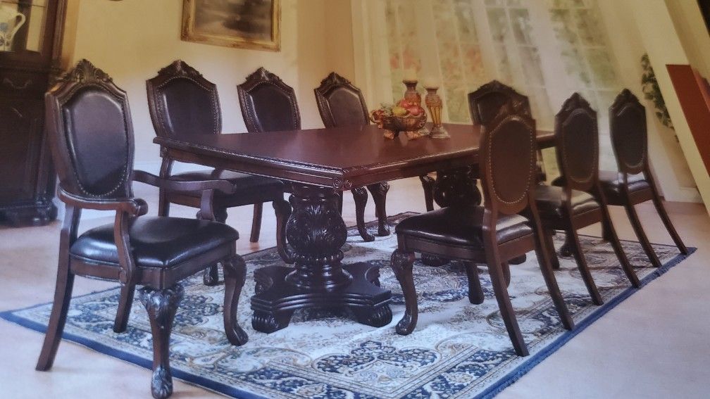 1 Table And 8 Chairs 1499