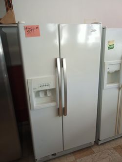 Whirlpool side by side refrigerator white clean 36" . Warranty . Delivery available . 2203 Fowler st. Ft. Myers 33901
