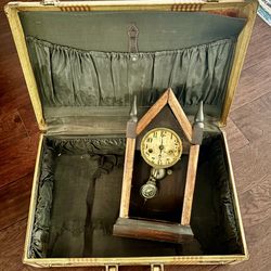 Antique windup clock suitcase