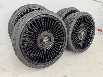 NEW 26 inch gloss black spoke wheels with Cadillac floating caps with 305/30r26 lexani tires