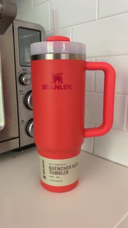 Brand new 30oz Stanley Quencher H2.0 tumbler in a bright coral/red color.