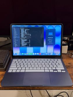 MacBook Neo indigo 256GB with case