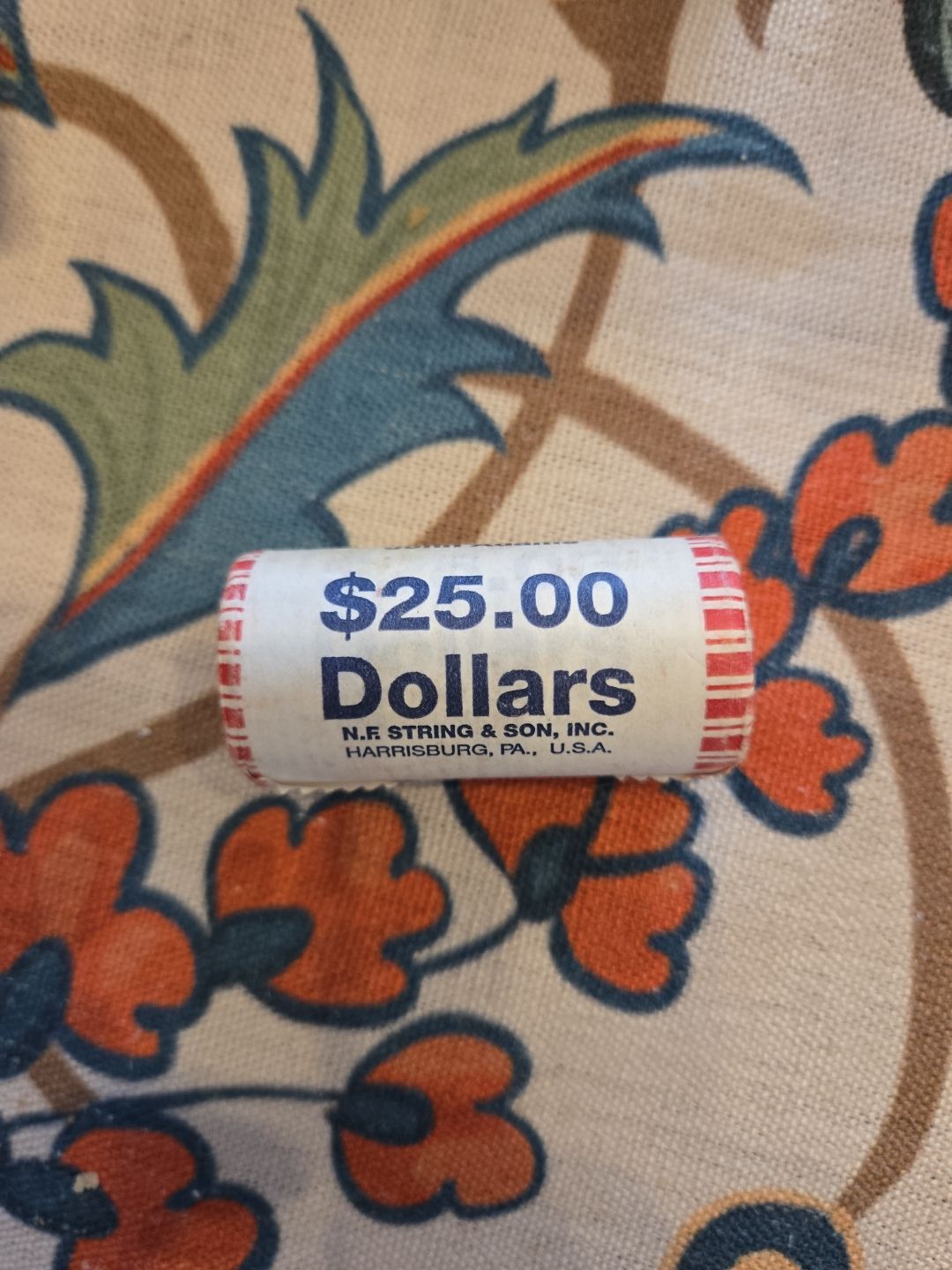 Gold dollars uncirculated James Adams roll