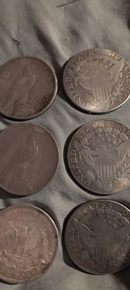 Morgan And Liberty Silver Dollars