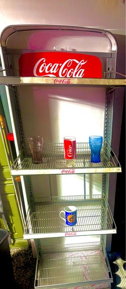 Coca-Cola soda display rack approximately 6 feet tall