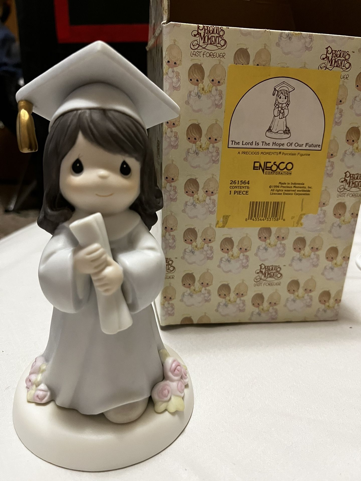 1996 precious Moment graduation Figurine