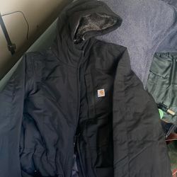 Woman’s Carhart Rain defender Jacket Size M