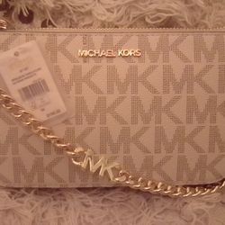 Micheal Kors "Jet Set" Clutch BRAND NEW WITH THE TAG!