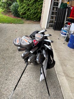 Lightly used golf clubs and bag