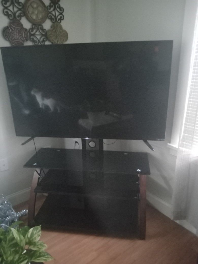 TLC 55"inch W/ Roku & TV stand