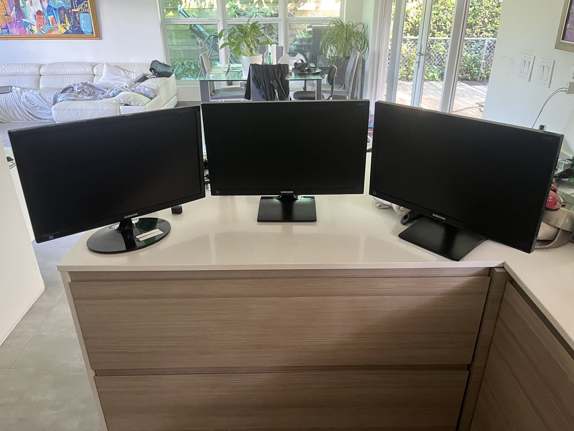 Three Samsung Monitors